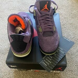 Jordan 4 Retro Green and Black Sneakers